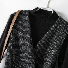 Longline belted tweed coat for women by Christine Brewer, featuring a classic tailored fit and textured fabric.