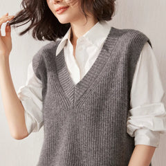 Cashmere ribbed knit sweater vest for women by Christine Brewer, featuring a close-up of the textured fabric and classic design.