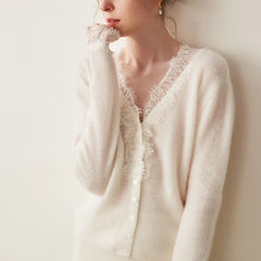 Elsa cashmere cardigan for women by Christine Brewer, shown in soft beige with a relaxed fit and cozy knit texture.