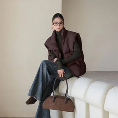 Christine Brewer Layla cropped puffer vest for women, lightweight quilted vest with stand collar and stylish design.