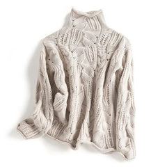 Cream-colored knit sweater for women by Christine Brewer, featuring a cozy, textured design perfect for casual wear.