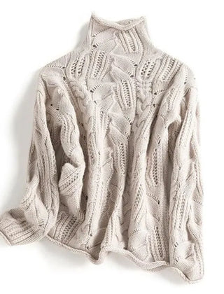 Cream-colored knit sweater for women by Christine Brewer, featuring a cozy, textured design perfect for casual wear.