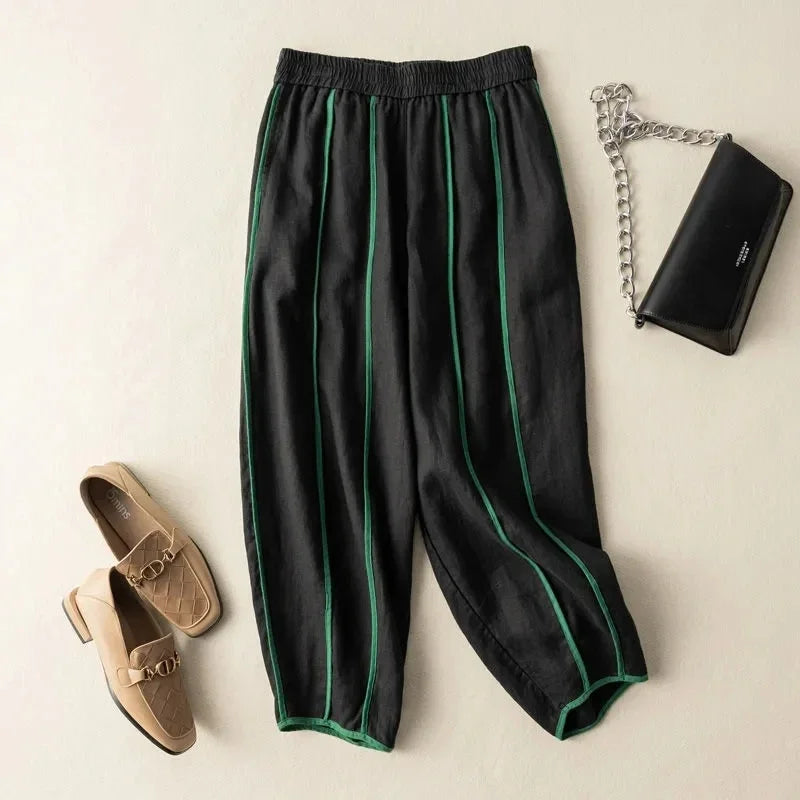 Women’s linen wide-leg elastic-waist trousers by Christine Brewer, loose pull-on pants with relaxed fit and comfortable style.
