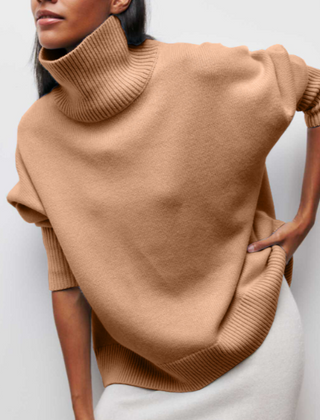 Women’s autumn turtleneck sweater by Christine Brewer, iris-colored knit with long sleeves and cozy fit.