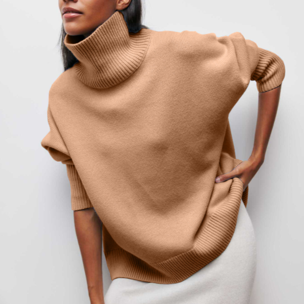 Women’s autumn turtleneck sweater by Christine Brewer, iris-colored knit with long sleeves and cozy fit.