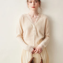 Elsa cashmere cardigan for women by Christine Brewer, soft cream-colored knit with long sleeves and open front design.