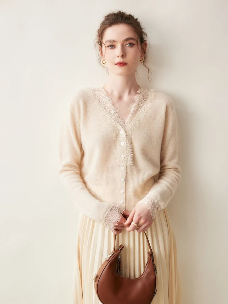 Elsa cashmere cardigan for women by Christine Brewer, soft cream-colored knit with long sleeves and open front design.