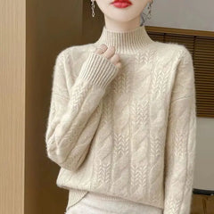 Christine Brewer Janet cashmere cable knit sweater for women, featuring cozy, textured fabric and classic design in neutral tones.