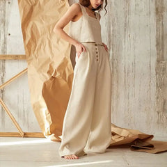 Women’s knit wide-leg elastic-waist trousers by Christine Brewer, featuring a loose pull-on design and relaxed fit.
