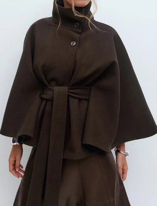 Emma belted cape coat for women by Christine Brewer, shown in a stylish, draped design with a belt at the waist.