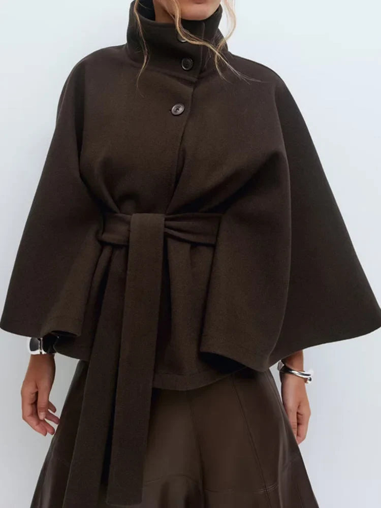 Emma belted cape coat for women by Christine Brewer, shown in a stylish, draped design with a belt at the waist.