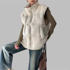 Christine Brewer Layla cropped puffer vest for women, featuring a stylish, quilted design and sleeveless fit for casual wear.