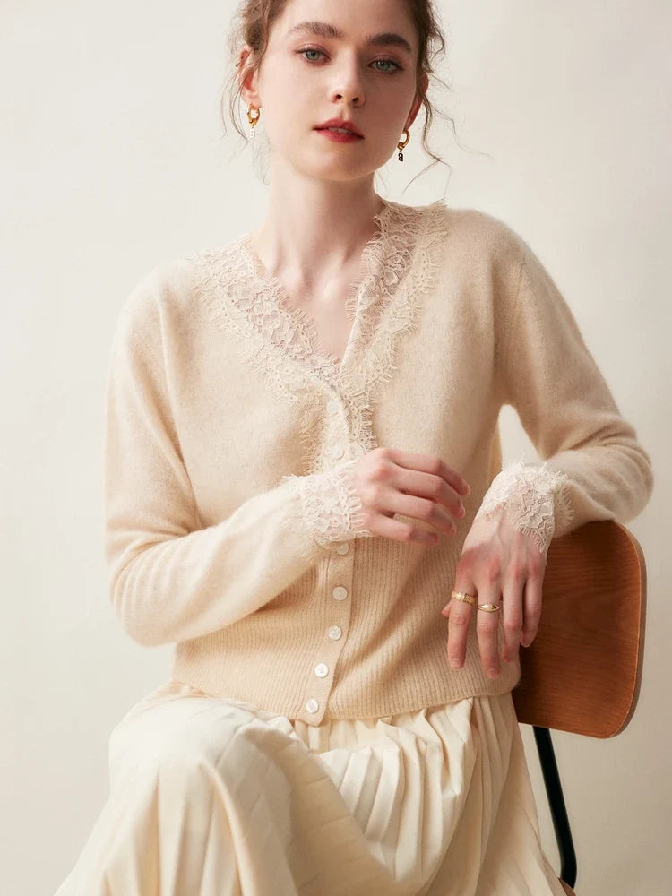 Elsa cashmere cardigan for women by Christine Brewer, soft cream-colored knit sweater with button front and long sleeves.