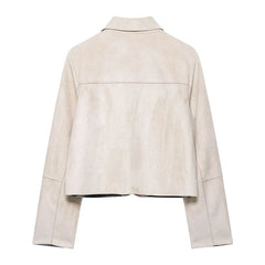 Hazel faux suede cropped jacket for women by Christine Brewer, shown in beige with long sleeves and collar detail.