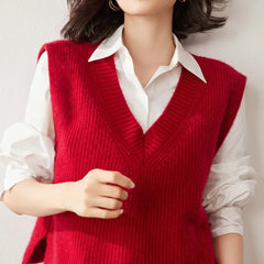 Cashmere ribbed knit sweater vest for women by Christine Brewer, featuring a stylish, cozy design with a V-neck and ribbed texture.