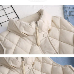 Ruby stand collar puffer vest for women by Christine Brewer, featuring quilted design and lightweight insulation.