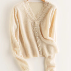 Elsa cashmere cardigan for women by Christine Brewer, soft cream knit with a relaxed fit and button-up front.