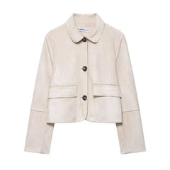 Hazel faux suede cropped jacket for women by Christine Brewer, shown in a stylish, fitted design with a soft suede texture.
