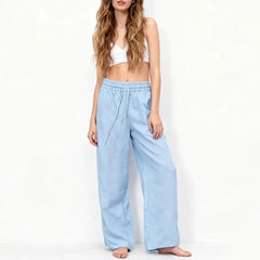 Women’s loose cotton linen wide-leg drawstring trousers by Christine Brewer, featuring a relaxed fit and pull-on style.