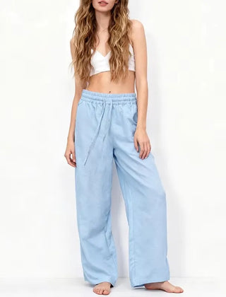 Women’s loose cotton linen wide-leg drawstring trousers by Christine Brewer, featuring a relaxed fit and pull-on style.