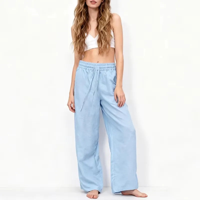 Women’s loose cotton linen wide-leg drawstring trousers by Christine Brewer, featuring a relaxed fit and pull-on style.