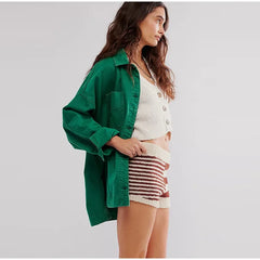 Charlotte oversized denim shirt jacket for women by Christine Brewer, shown in classic blue denim with button front and relaxed fit.