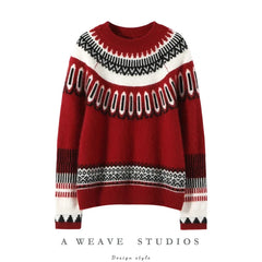 Women’s cashmere crew neck sweater by Christine Brewer, featuring a soft, cozy fit in a classic style.