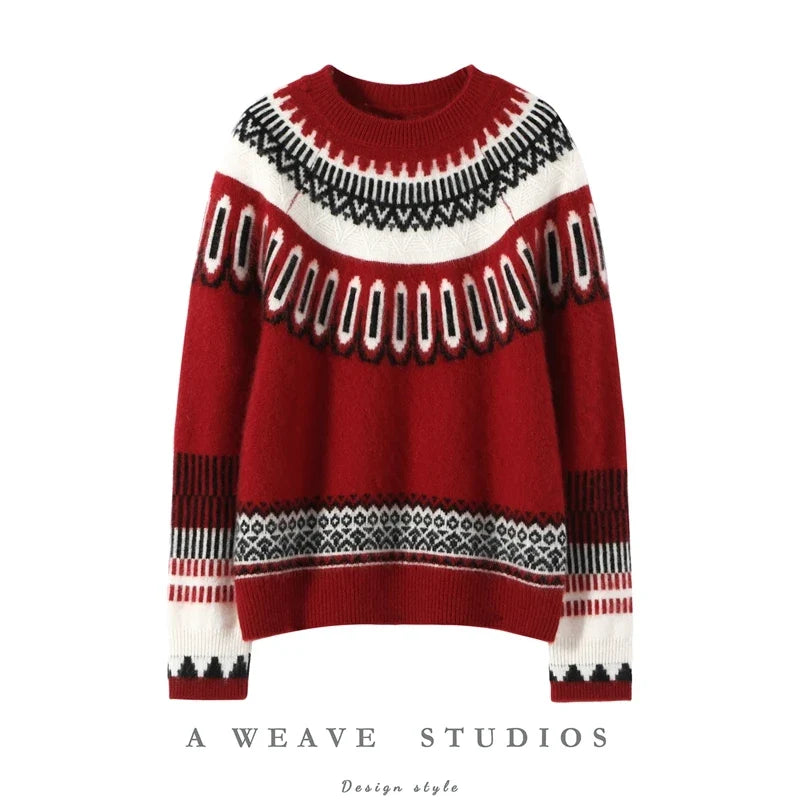 Women’s cashmere crew neck sweater by Christine Brewer, featuring a soft, cozy fit in a classic style.