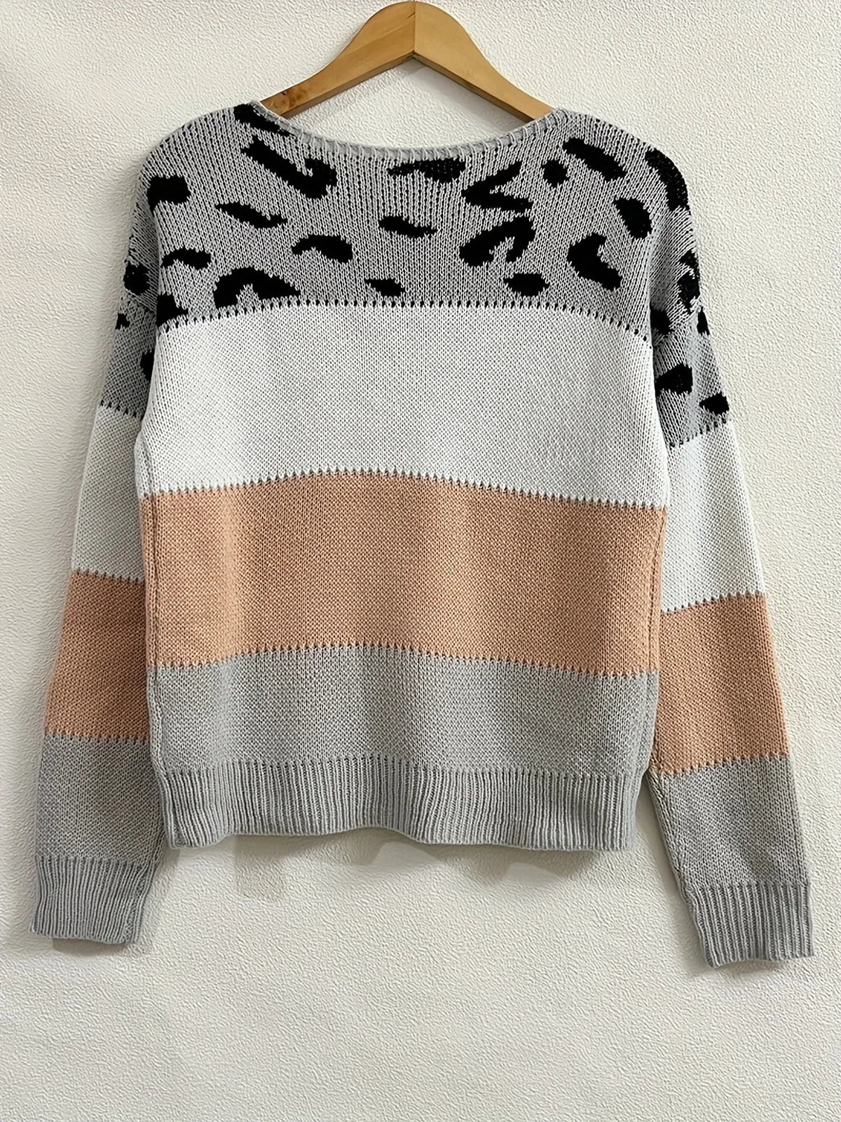 Leopard print graphic sweater for women by Christine Brewer featuring a stylish, cozy knit design in neutral tones.