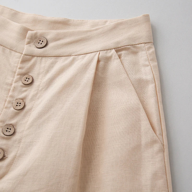 Women’s knit wide-leg elastic-waist trousers by Christine Brewer, loose pull-on pants with a relaxed fit, shown in natural fabric.