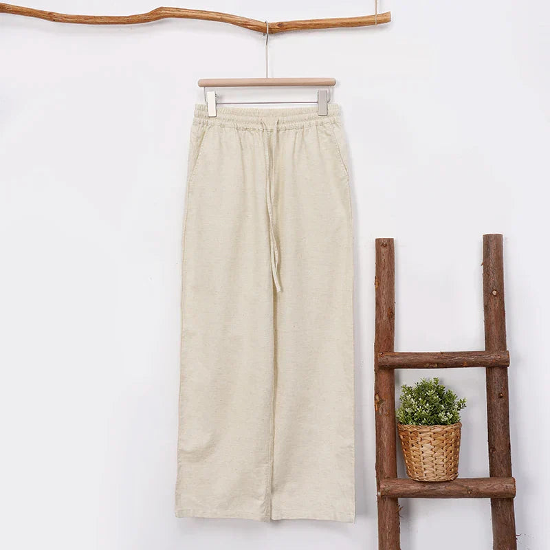 Women’s loose cotton linen wide-leg drawstring trousers by Christine Brewer, featuring a relaxed fit and pull-on design.