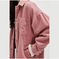 Oversized denim shirt jacket for women from Christine Brewer featuring classic blue denim and relaxed fit.