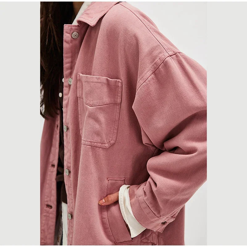 Oversized denim shirt jacket for women from Christine Brewer featuring classic blue denim and relaxed fit.