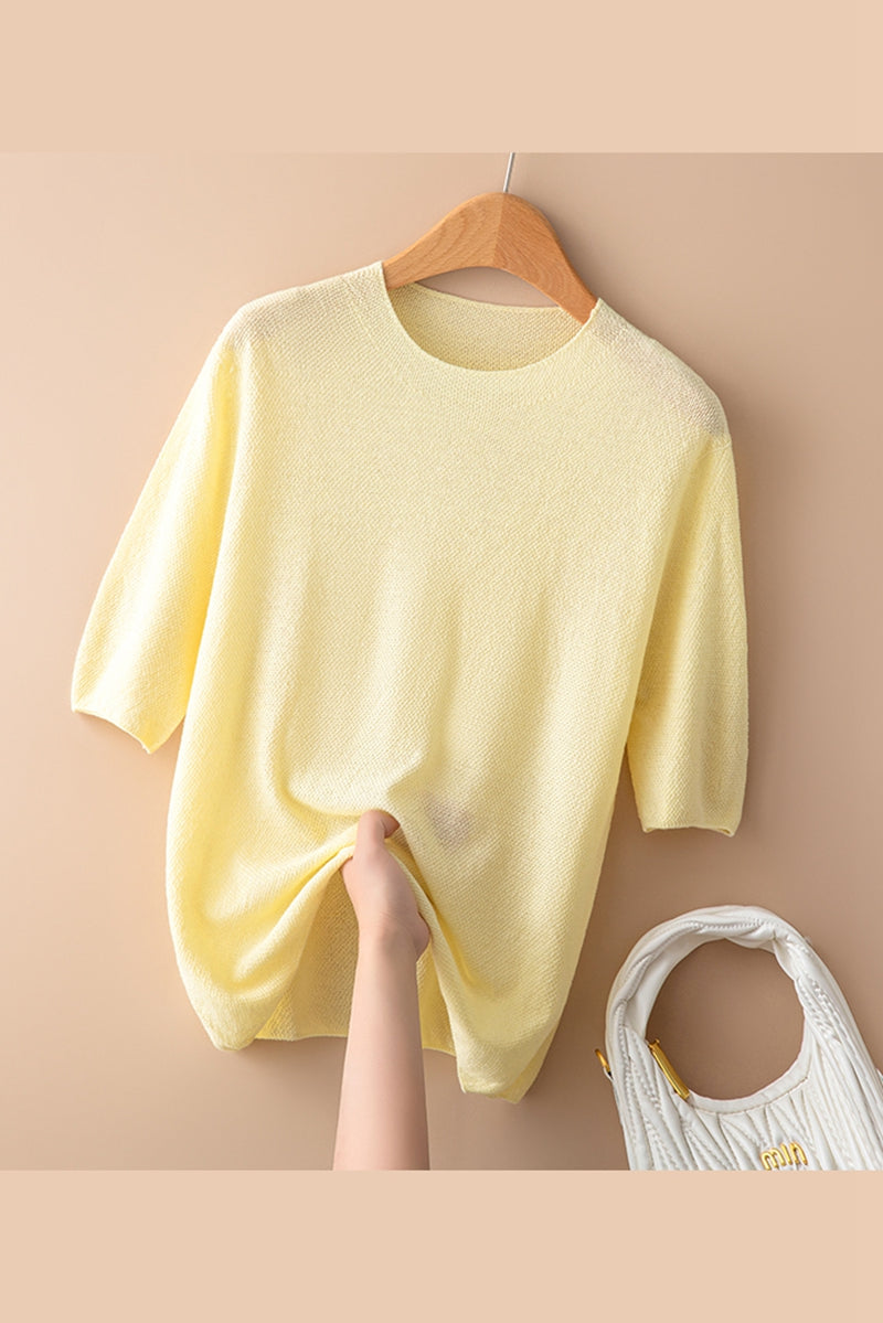 Women’s wool sweater by Christine Brewer, featuring a cozy knit design and classic fit, ideal for casual winter wear.
