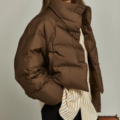Hannah cropped quilted women's parka by Christine Brewer, shown in a stylish, fitted design with a high collar and quilted pattern.