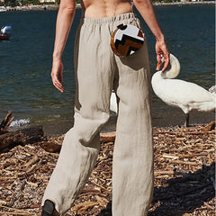Women’s knit wide-leg drawstring trousers by Christine Brewer, loose pull-on pants with a relaxed fit and comfortable waistband.