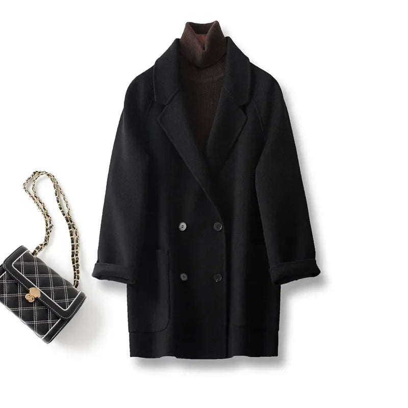 Brown double-breasted wool coat for women by Christine Brewer, featuring classic tailored style and button details.