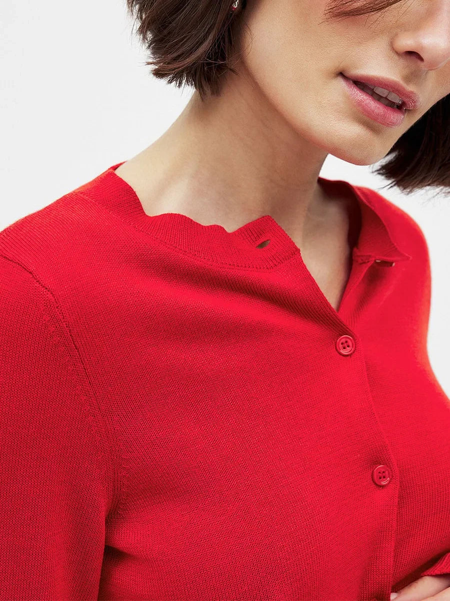 Women’s knit cardigan by Christine Brewer featuring a classic fit and soft, textured fabric in a neutral color.