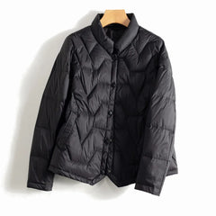 Christine Brewer Aurora short quilted puffer jacket for women, featuring a stylish, padded design perfect for cold weather.