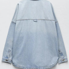 Relaxed fit denim shirt jacket for women by Christine Brewer, featuring classic design and casual style.
