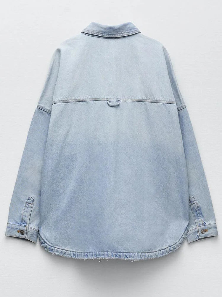 Relaxed fit denim shirt jacket for women by Christine Brewer, featuring classic design and casual style.