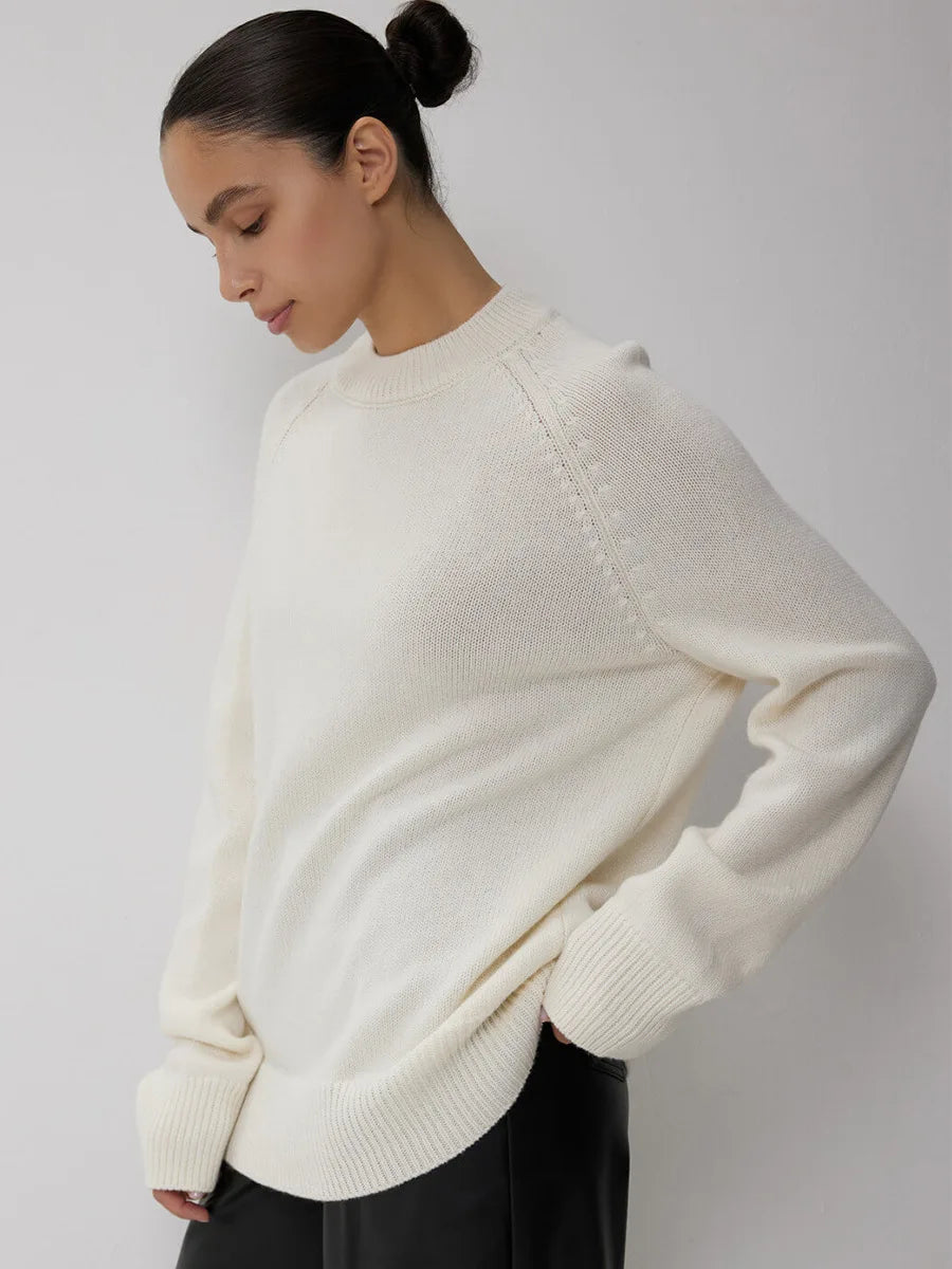 Oversized wool sweater for women by Christine Brewer featuring a cozy, chunky knit in soft, neutral tones.