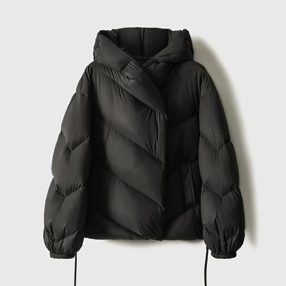 Grace cropped hooded puffer jacket for women by Christine Brewer, featuring a stylish quilted design and hooded silhouette.