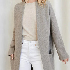 Jacqueline merino wool cardigan for women by Christine Brewer, featuring a cozy knit with button closure and ribbed cuffs.