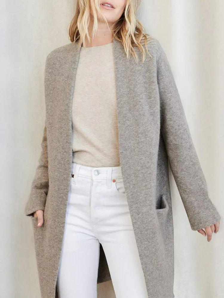Jacqueline merino wool cardigan for women by Christine Brewer, featuring a cozy knit with button closure and ribbed cuffs.
