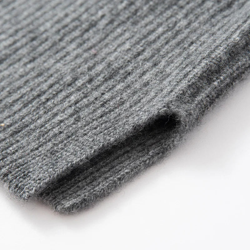 Cashmere ribbed knit sweater vest for women by Christine Brewer, featuring a stylish, cozy design in soft fabric.