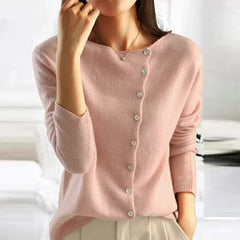 Woman wearing the Dorothy knit sweater for women by Christine Brewer, featuring a cozy, textured design in a soft fabric.