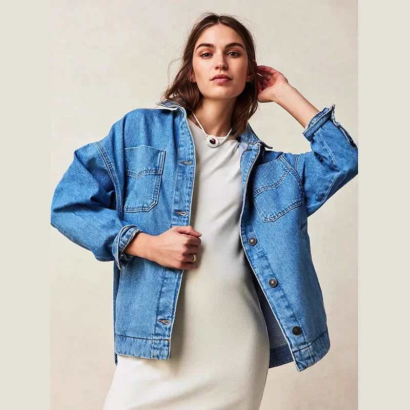 Charlotte oversized denim shirt jacket for women by Christine Brewer, featuring classic blue denim and relaxed fit.