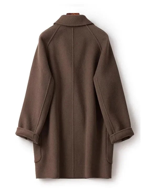 Brown double-breasted wool coat for women by Christine Brewer, featuring classic tailored design and stylish lapels.