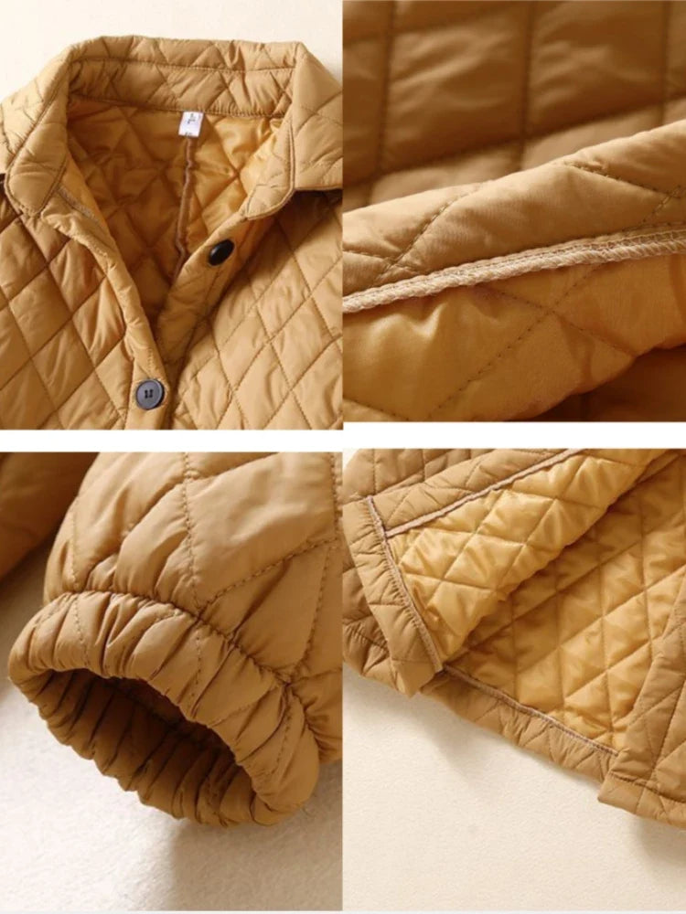 Longline women’s puffer jacket by Christine Brewer, Elena style, featuring a sleek, insulated design ideal for cold weather.